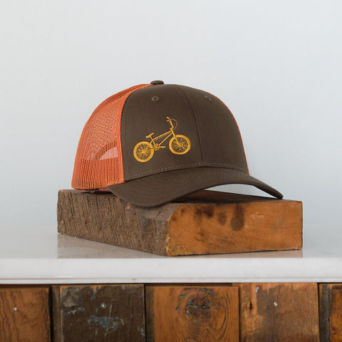 Bicycle Embroidered Trucker Hat - Rust and Loden with Goldenrod Bike