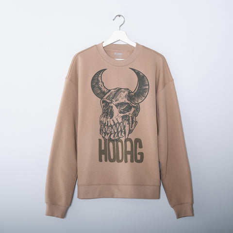 A beige crew sweatshirt with a printed Hodag skull design on the front, displayed on a hanger.