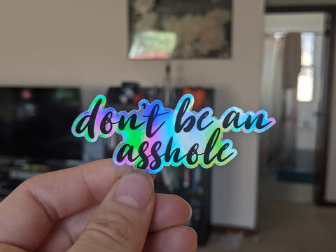 Don't be an asshole cursive vinyl sticker: Holographic