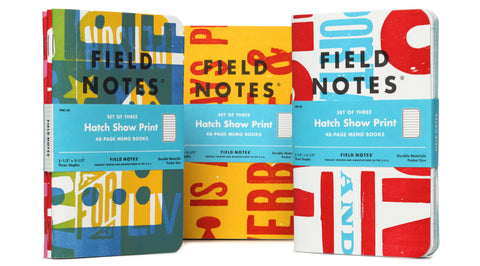 set of three memo note books with hatch print poster covers