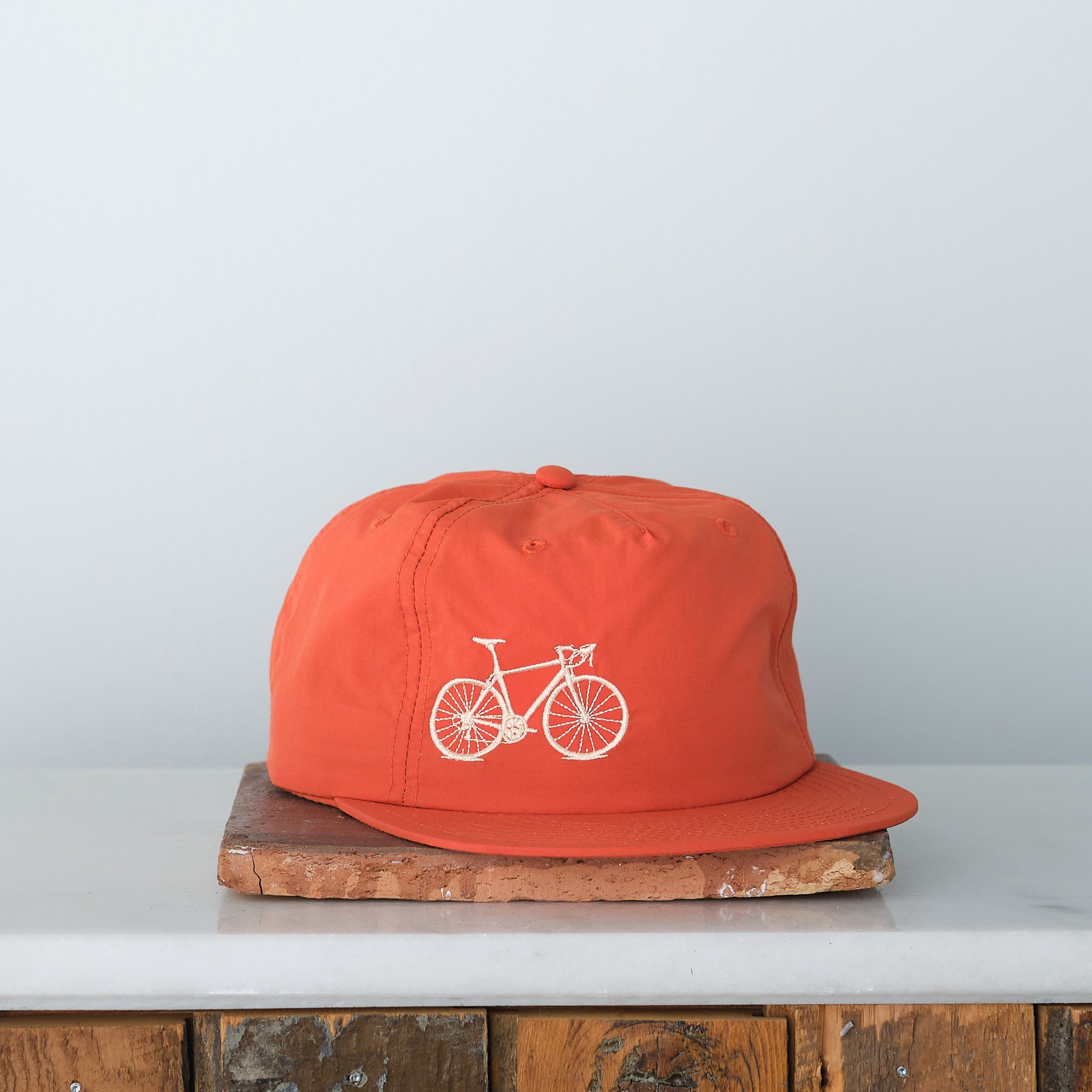 Bicycle Embroidered Nylon Trucker Cap, Persimmon